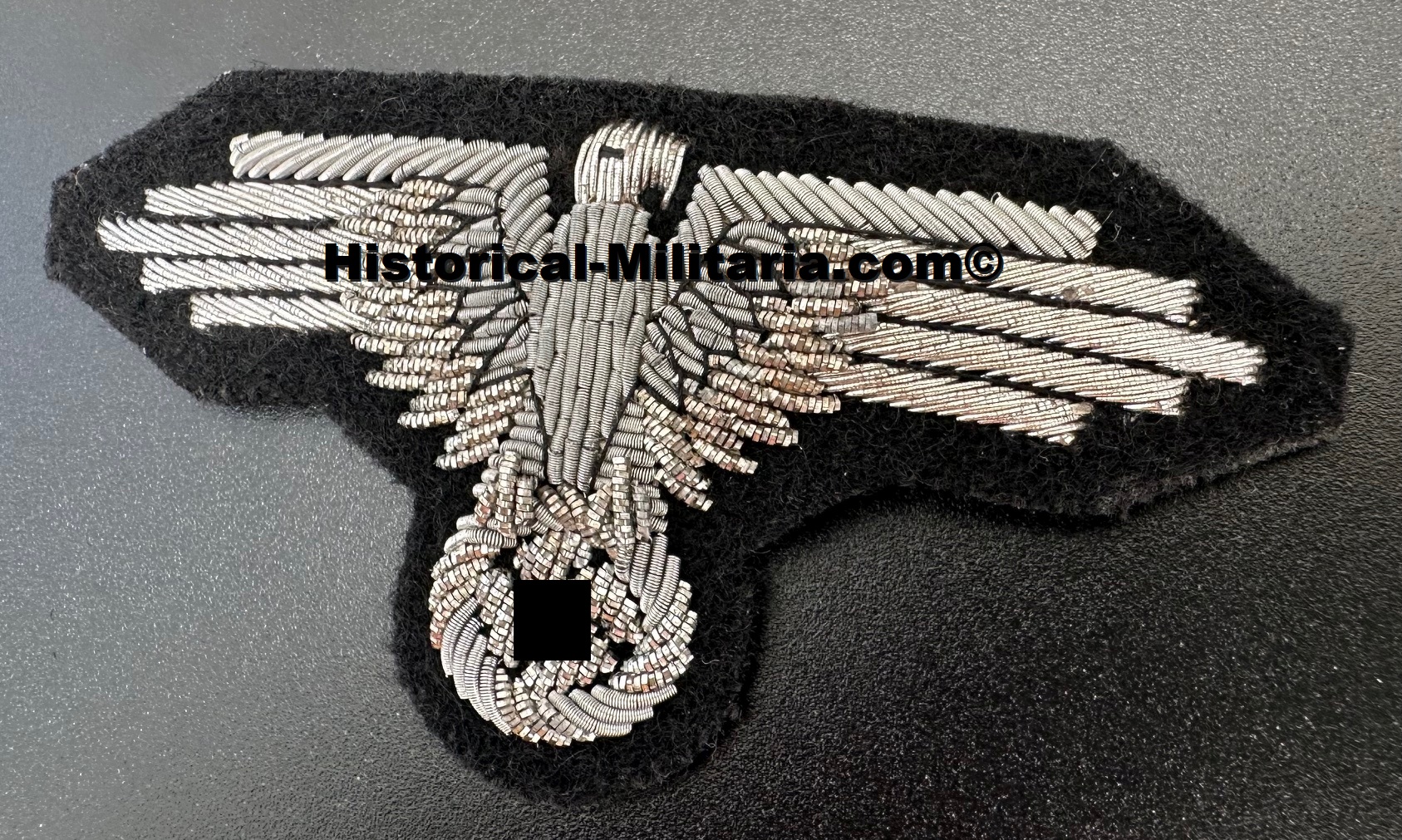 Waffen-SS Officer sleeve eagle aged - Offiziersadler Ärmeladler Elite Waffen-SS gealtert - Aquila da braccio opaco Ufficiale delle Waffen-SS invecchiata Waffen-SS Officer sleeve eagle aged - Offiziersadler Ärmeladler Elite Waffen-SS gealtert - Aquila da braccio opaco Ufficiale delle Waffen-SS invecchiata