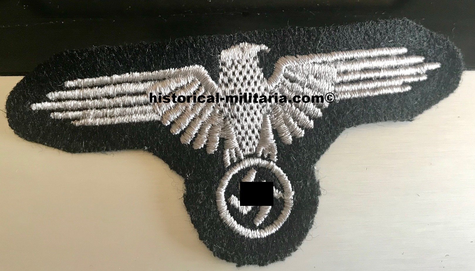 Waffen-SS EM/ NCO sleeve eagle RZM machine-embroidered in greyish silver cotton threads - Maschinengestickter SS Ärmeladler Mannschaften - Aquila SS da braccio per le truppe delle Waffen-SS